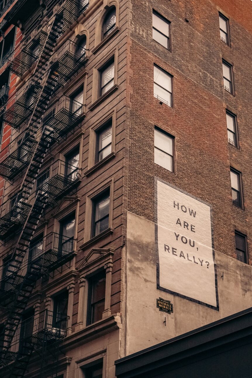 Building with sign 'How are you really?'