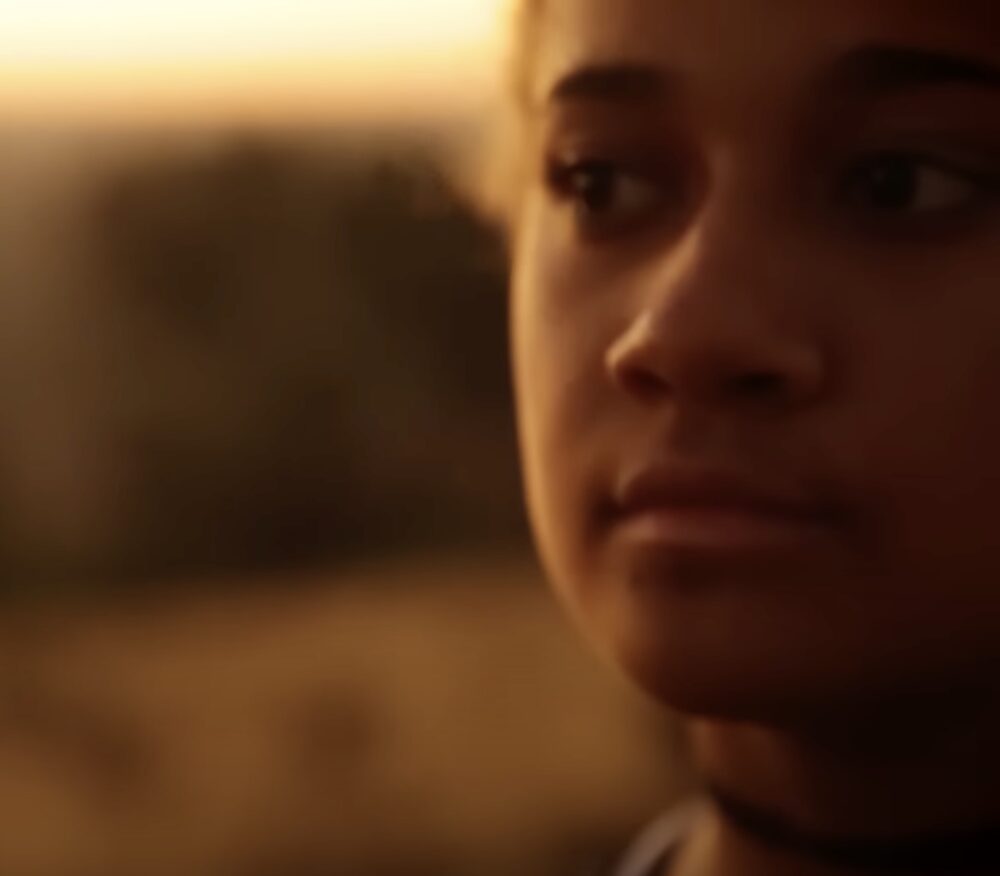 Young Aboriginal woman at sunset in Bourke